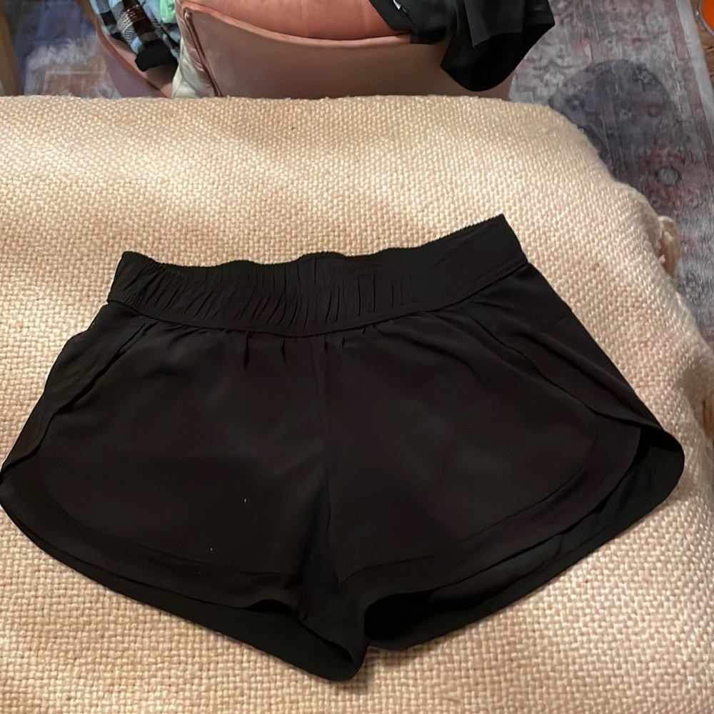 Not sure what brand, size small, colors is black